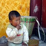 Chinese pick up smoking from an early age. Like this 3-year-old?